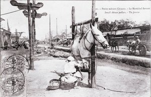 Piccolo mestiere: il ferrante cinese Fotografia dell