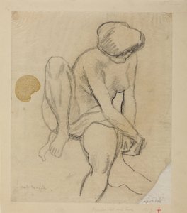 Nudo femminile seduto con telo