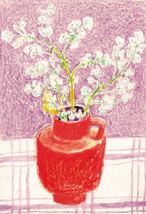 Vaso rosso con fiori dai colori vivaci