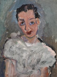 Giovane donna in camicetta bianca