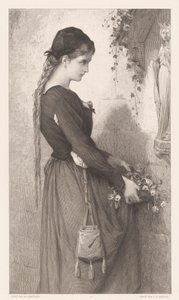 Giovane donna porta fiori a una nicchia con statua della Madonna