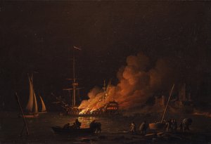 Nave in fiamme di notte