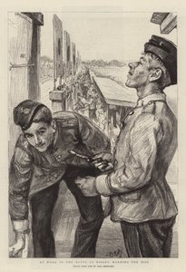 Al lavoro nei bersagli a Bisley, segnando i colpi