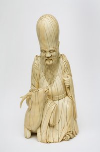 Figura in avorio scolpito di Shou Xing seduto con cervo, c.1580-1644