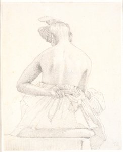 Modello femminile seduto visto da dietro