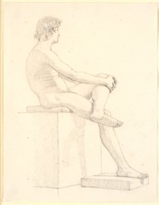 Giovane modello maschile seduto