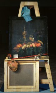 Cavalletto del pittore con natura morta di frutta