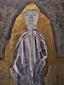 Figura meditativa dorata