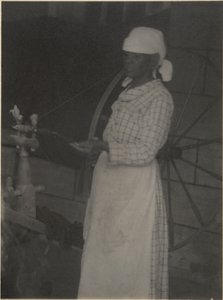 Donna alla ruota da filare