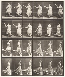 Piastra 140. Scendendo le scale guardandosi intorno e sventolando un ventaglio da Eadweard Muybridge