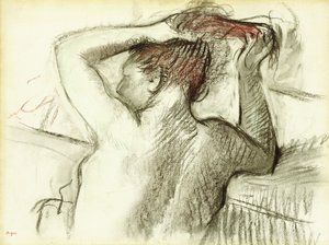 Donna nuda che si pettina