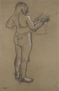 Donna nuda che si asciuga