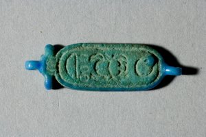 Perla con il cartiglio di Tutankhamon, Nuovo Regno, regno di Tutankhamon, 1336-27 a.C. (faience)