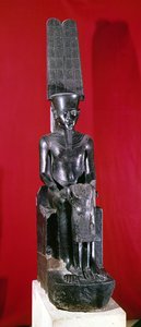 Statua seduta del dio Amon che protegge Tutankhamon, Nuovo Regno, c.1336-1327 a.C.