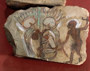 Ostrakon che raffigura una scimmia che raccoglie datteri osservata da un giovane uomo dall