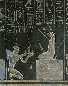 Rilievo in dolerite di Nectanebo I, re che offre un dono al demone con testa di coccodrillo, da Heliopolis al tempio di Atum da Egyptian 30th Dynasty