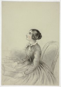 Giovane donna ispirata mentre legge