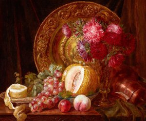 Crisantemi, frutta e piatti