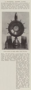 Orologio fatto di proiettili e conchiglie boere da English Photographer