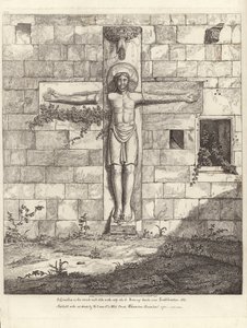 Un crocifisso sulla parete esterna del transetto sud della chiesa di Rumsey