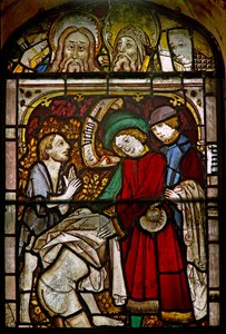 Un pannello nella finestra est che raffigura le Opere di Misericordia: vestire i nudi; anche alcune teste finemente riposizionate da English School