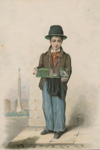 Un ragazzo che tiene una gabbia con topi bianchi