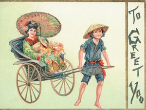 Ragazza geisha tirata in un carretto