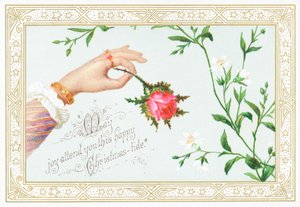 Mano di donna che tiene una rosa