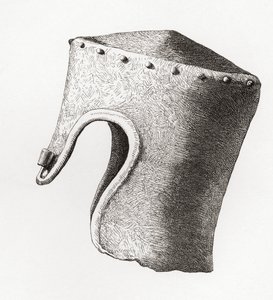 Elmo cilindrico a sommità piatta del XIII secolo con nasale, scavato al Castello di Montgomery nel 1841, da The British Army: Its Origins, Progress and Equipment, pubblicato nel 1868 da English School
