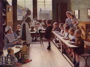 Bambini piccoli a pranzo in un asilo nido