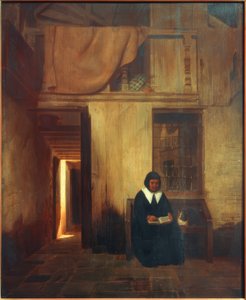 Interno con donna che legge e gatto