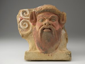 Antefissa a forma di testa di satiro