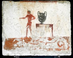 Arte etrusca: un giovane efebo nudo vicino a un tavolo dove è posto un vaso. Affresco della tomba del "tuffatore". Dal cimitero meridionale di Paestum. 480-470 a.C.