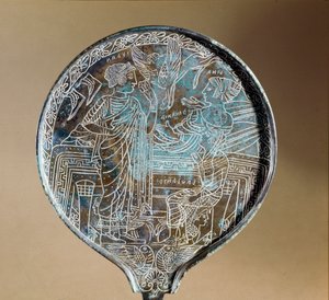 Arte etrusca: retro di uno specchio in bronzo: Afrodite persuade Elena a seguire Paride a Troia. V secolo a.C. Roma, Museo Nazionale di Villa Giulia da Etruscan
