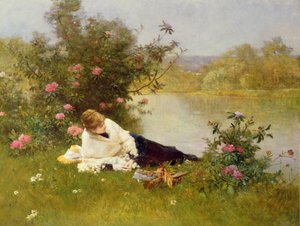 Donna su una riva del fiume