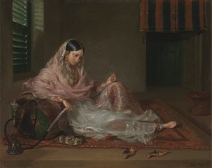 Signora musulmana reclinata