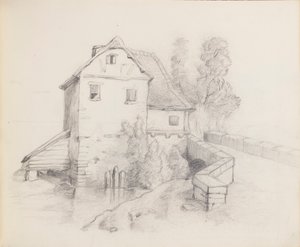Casa del mulino vicino a un ruscello