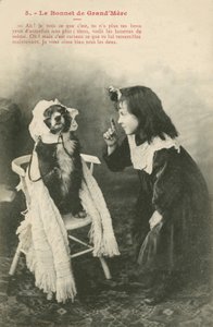 Bambina che veste il suo cane con un cappellino da French Photographer