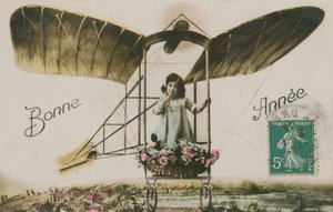 Cartolina di auguri di Capodanno con una ragazza in un aeroplano da French Photographer