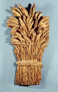 Insegna del fornaio con spighe di grano e fiori di campo