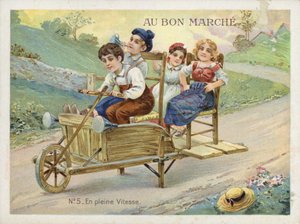 Bambini che giocano su una carriola trasformata da French School