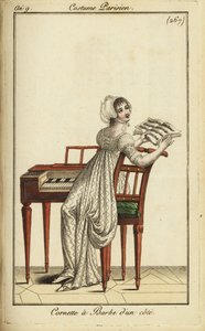 Donna alla moda che suona un clavicembalo