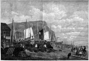 Barche da pesca sulla spiaggia di Hastings, Inghilterra
