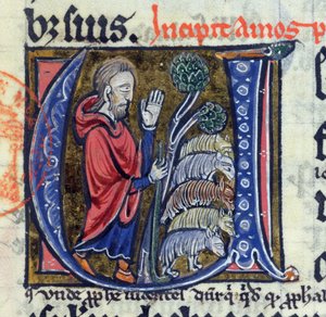 Iniziale istoriata U raffigurante il profeta Amos che guida il suo gregge, da una Bibbia latina, XIV secolo da French School