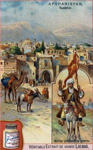 La città di Kandahar in Afghanistan con un Mullah che predica la guerra. Cromolitografia pubblicitaria del XIX secolo