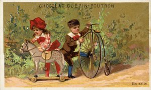 Cavallo giocattolo e triciclo