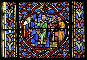 Vetrata raffigurante una scena della vita di San Artheme: Un incendio nella città di Clermont richiede lo spostamento delle reliquie del Santo. Una processione porta il reliquiario e arriva al fuoco da French School