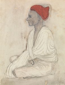 Uomo con un Turbante Rosso Seduto a Gambe Incrociate