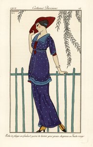 Donna in abito da spiaggia di foulard decorato con grandi pois, cappello di camoscio rosso da Georges Barbier