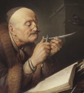Studioso che affila una penna d